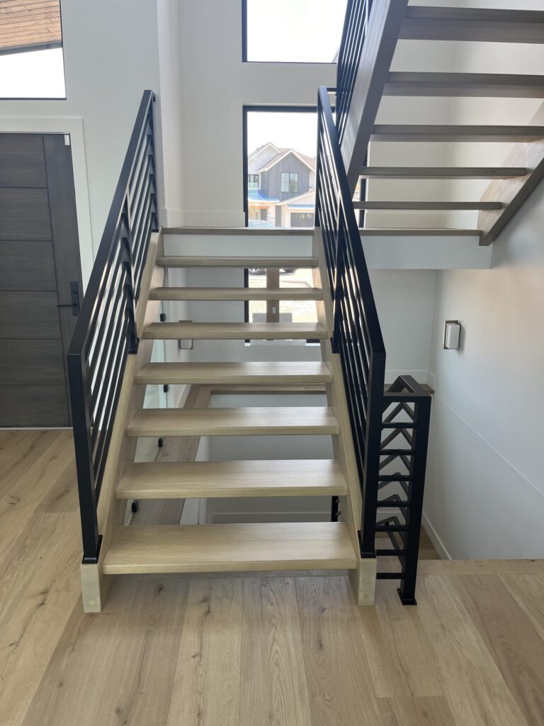 Welded Metal Railing Open Rise Housed Stairs